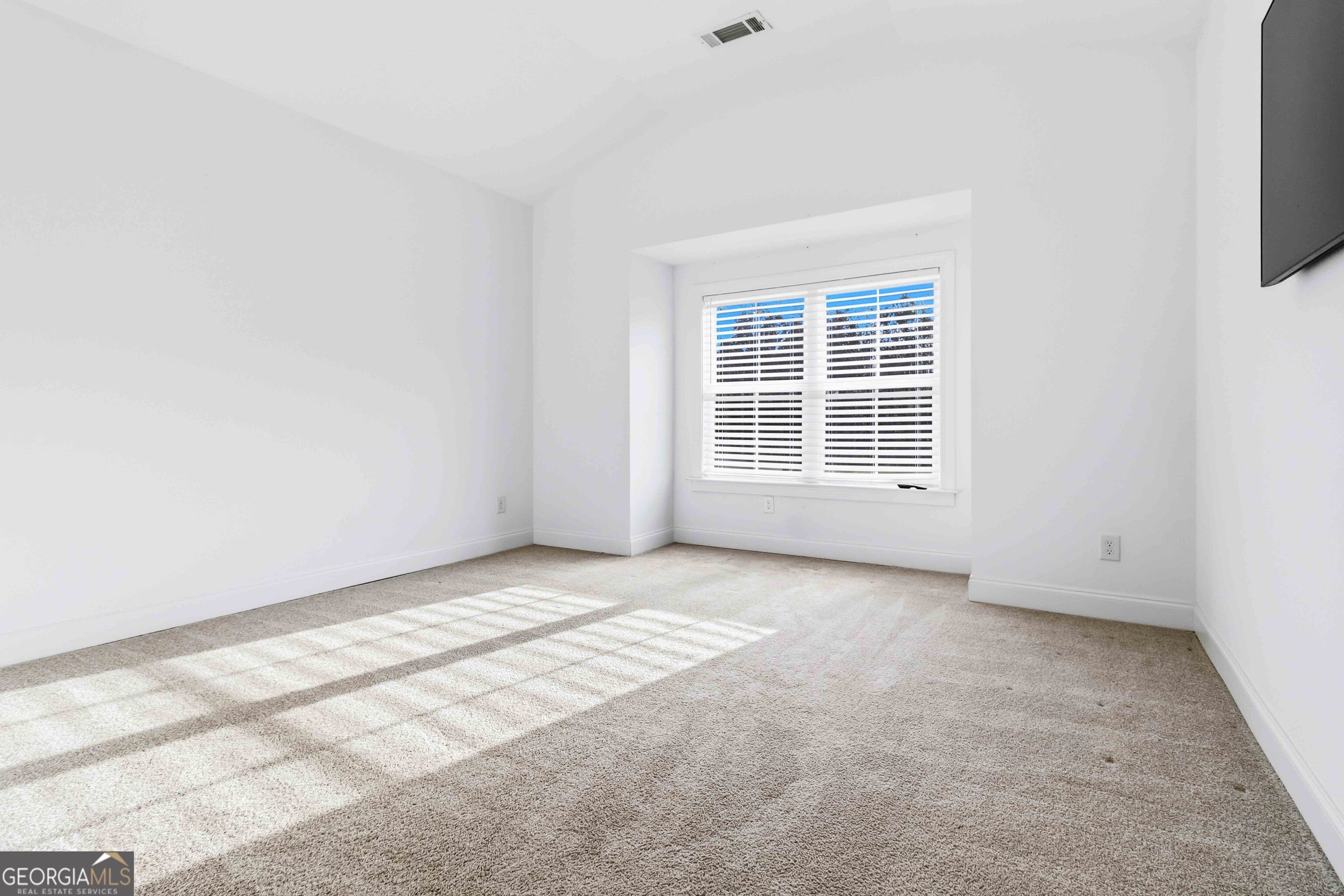2950 Stone Road Watkinsville, GA 30677 - Photo 17 of 53 an empty room with windows