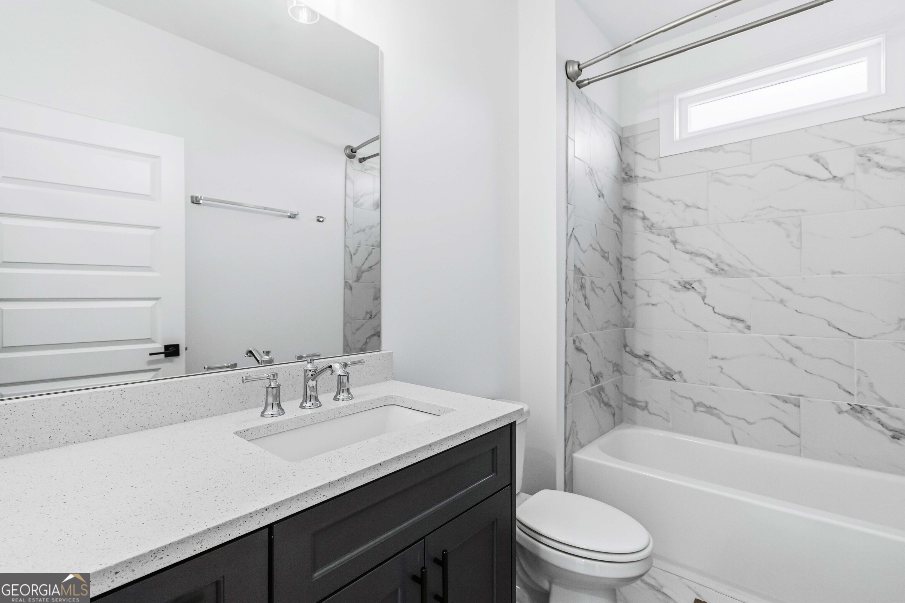 2950 Stone Road Watkinsville, GA 30677 - Photo 21 of 53 a bathroom with a sink a toilet and shower