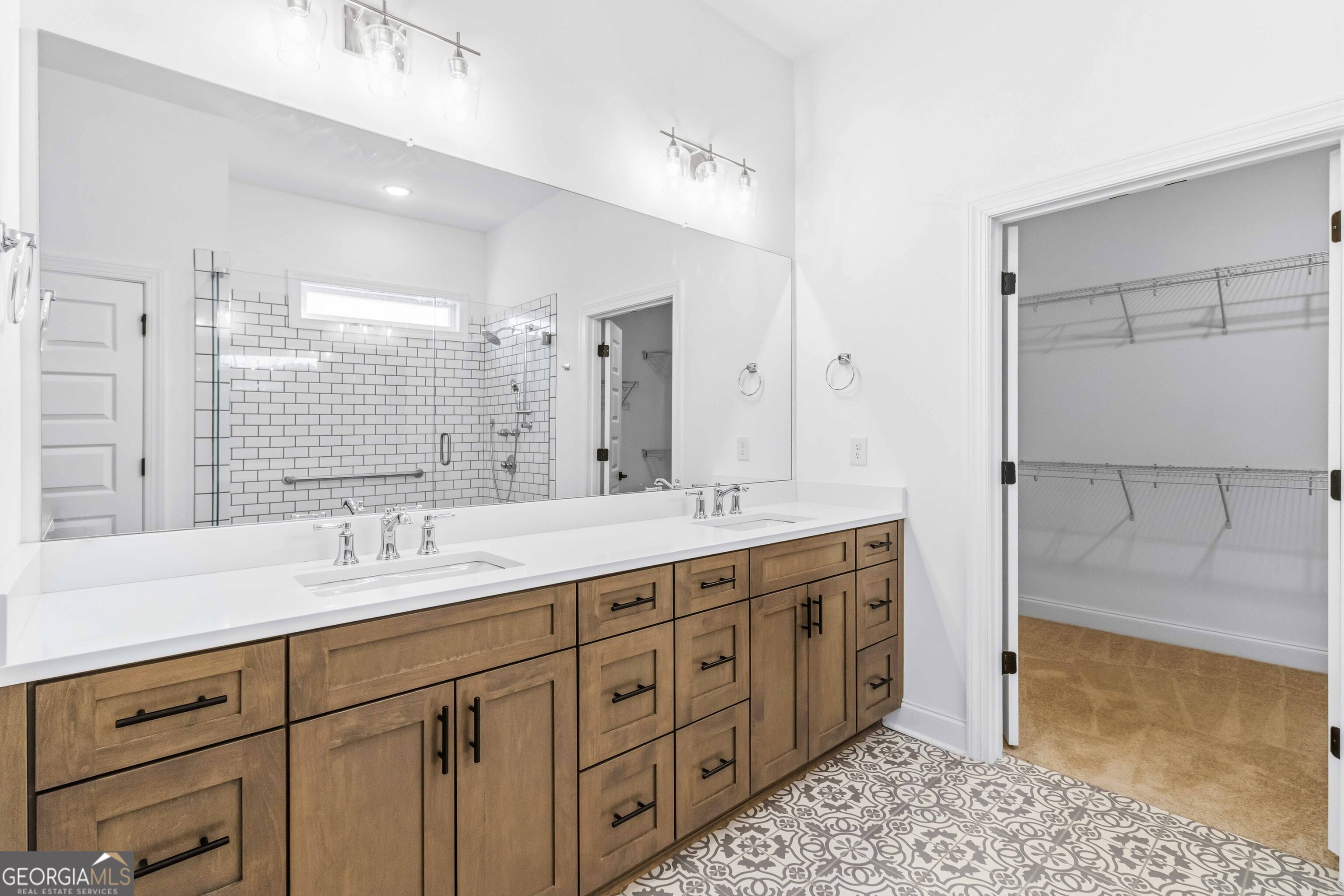 2950 Stone Road Watkinsville, GA 30677 - Photo 24 of 53 a spacious bathroom with double vanity and a mirror
