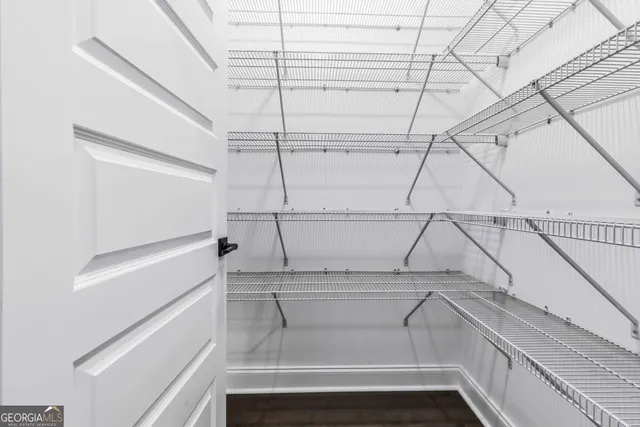 a view of a room with racks on the wall