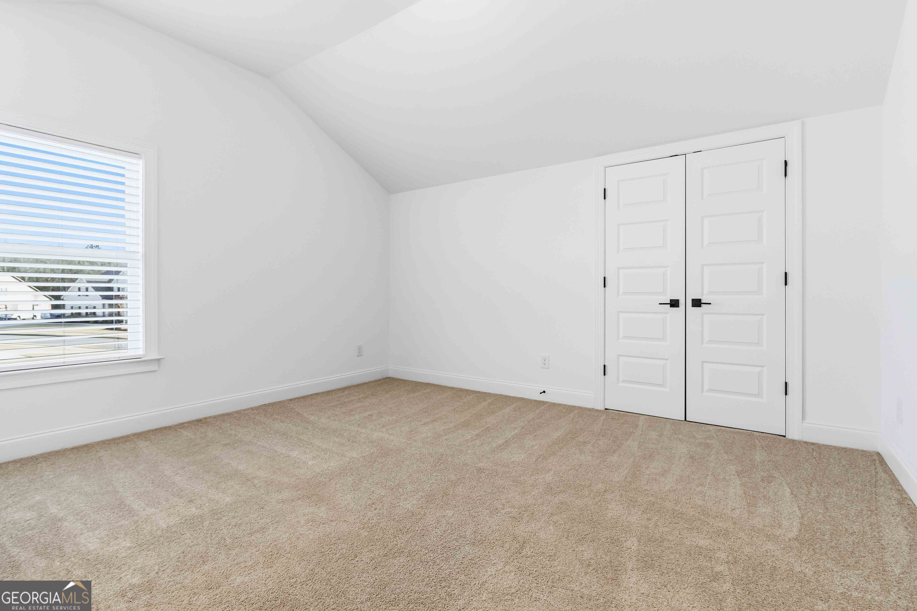 2950 Stone Road Watkinsville, GA 30677 - Photo 33 of 53 an empty room with a window