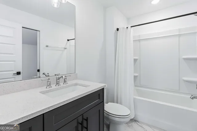 a balcony with furniture and wooden floor