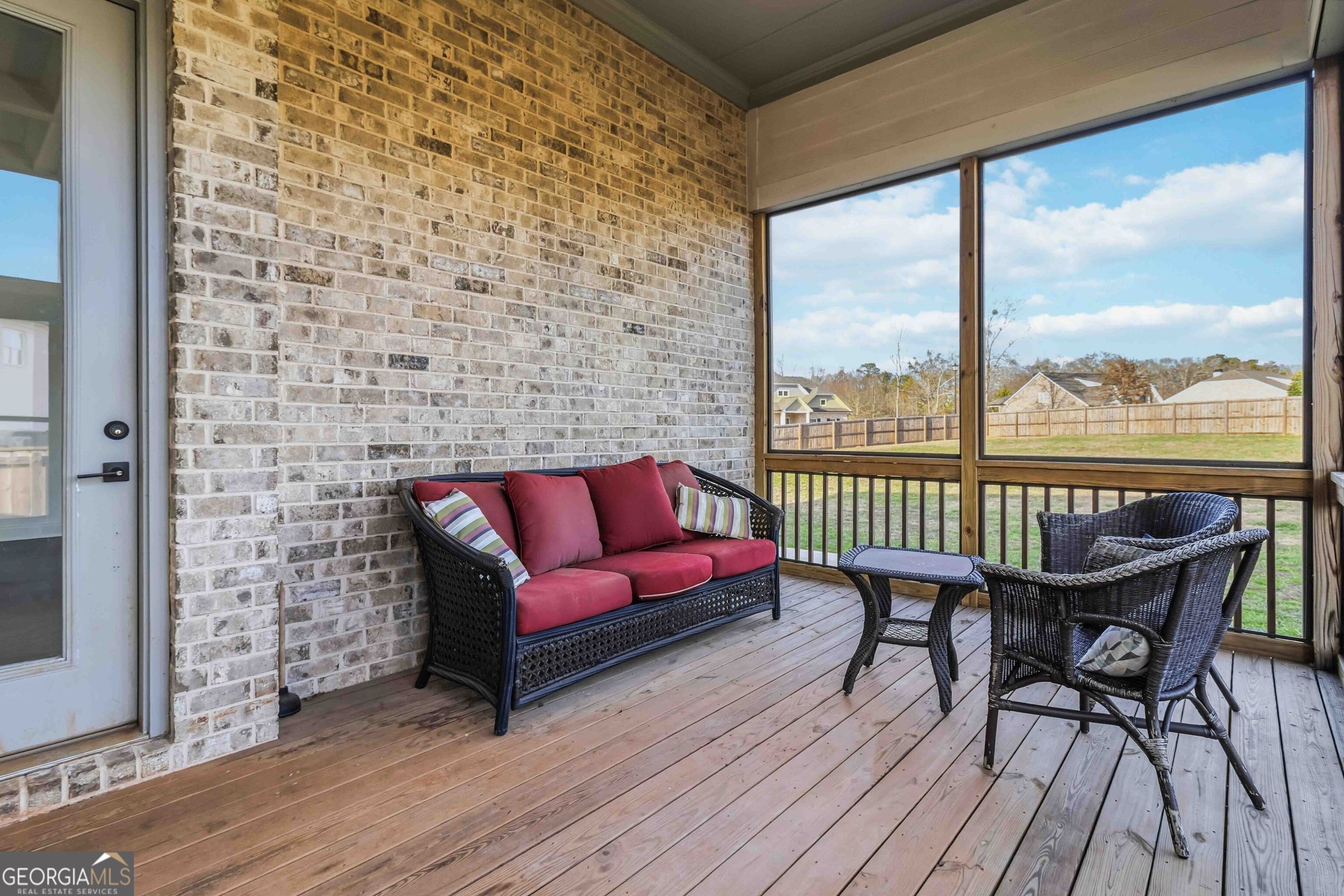 2950 Stone Road Watkinsville, GA 30677 - Photo 37 of 53 a balcony with wooden floor table and chairs