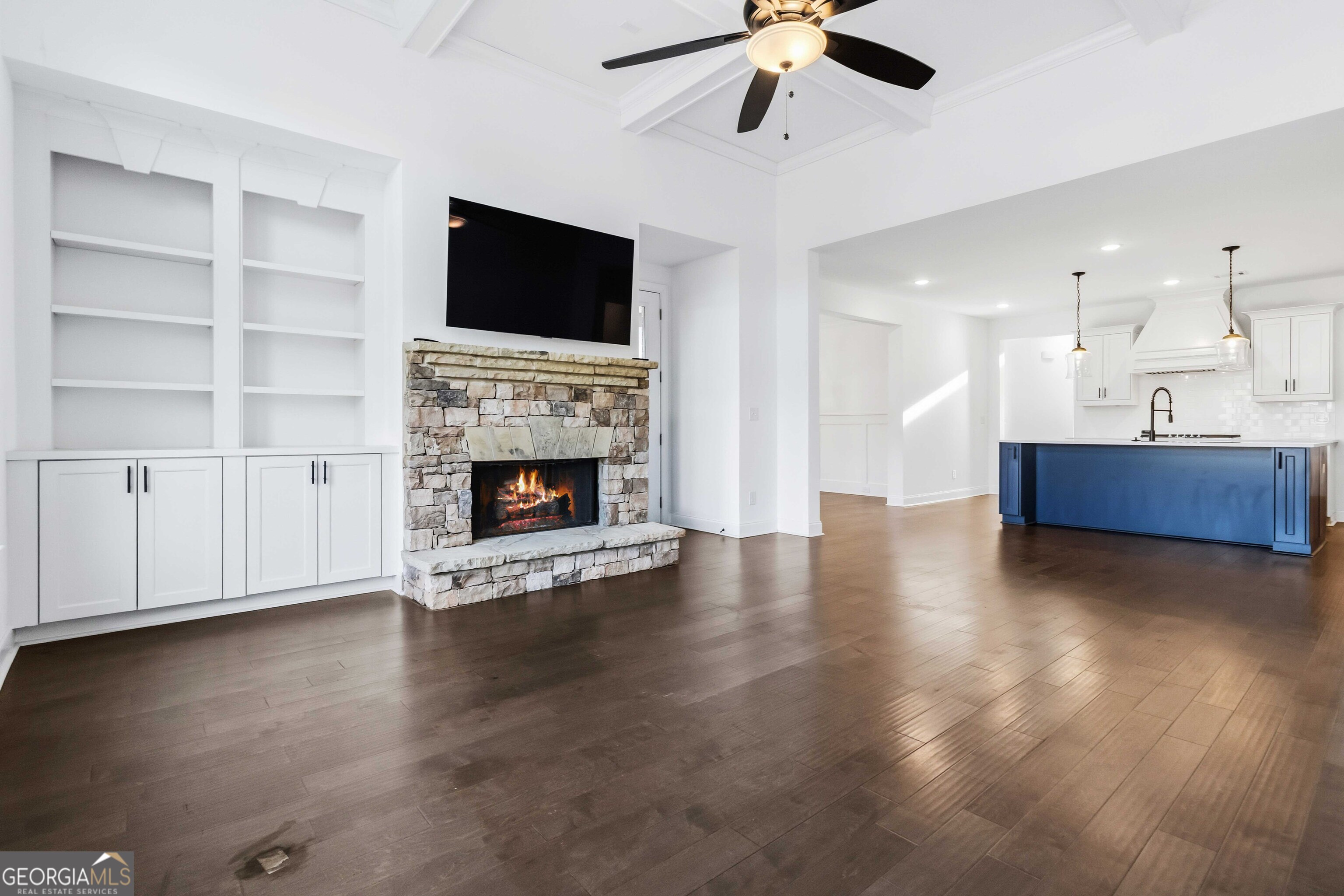 2950 Stone Road Watkinsville, GA 30677 - Photo 8 of 53 a view of empty room with wooden floor and fireplace