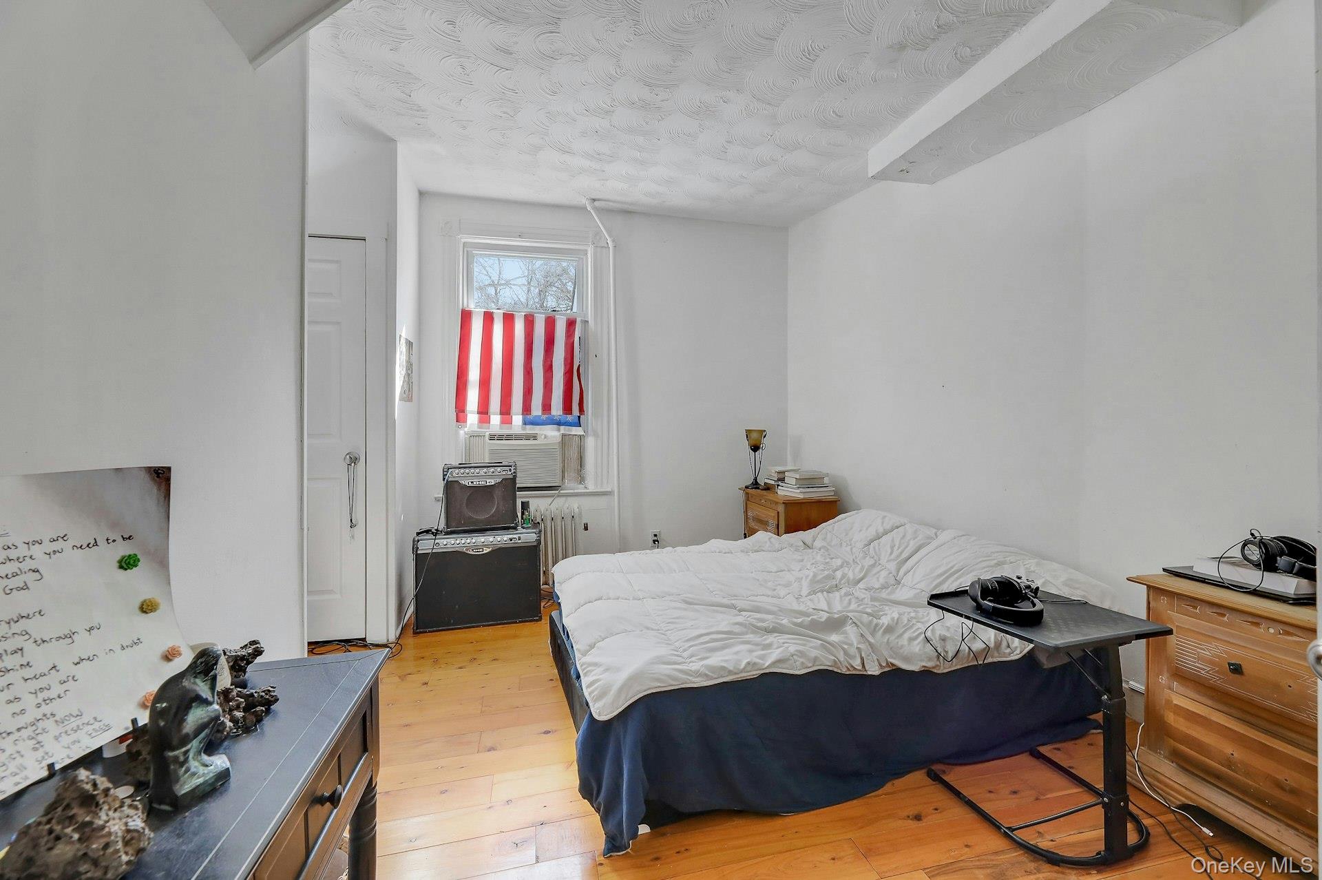 65 Lake Road Valley Cottage, NY 10989 - Photo 14 of 33 a bedroom with a bed and dresser