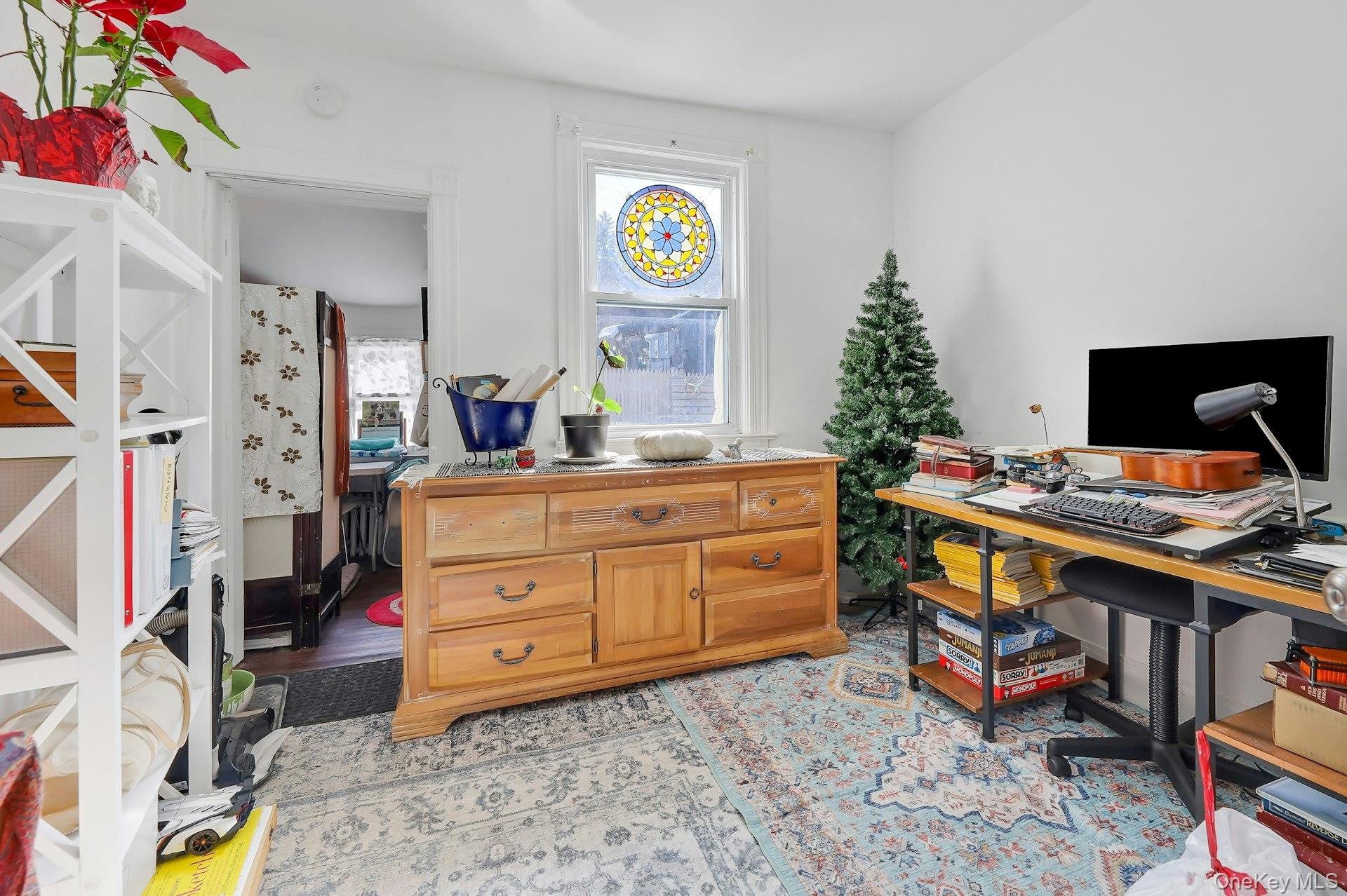 65 Lake Road Valley Cottage, NY 10989 - Photo 8 of 33 a bedroom with a bed and a desk