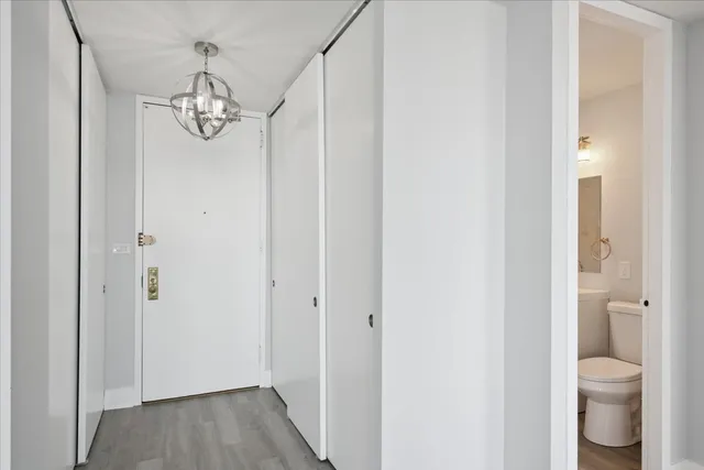 an aerial view of city and lake