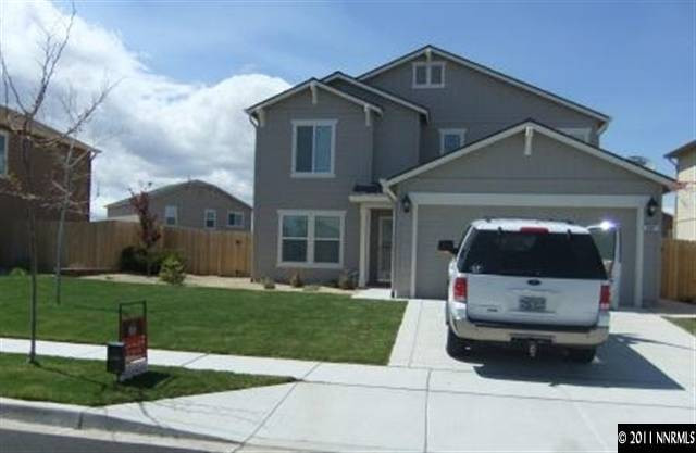 8967 Grisom Way Reno, NV 89506 - Photo 1 of 12 a front view of a house with garden
