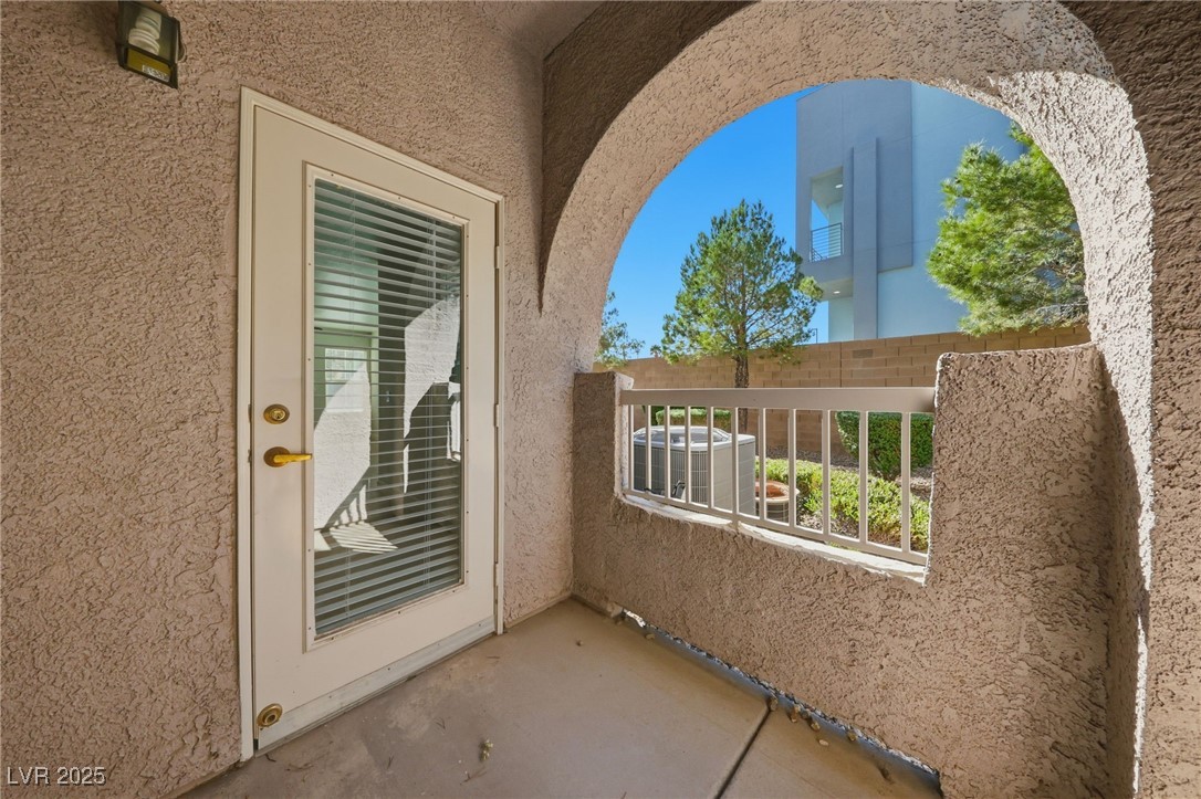 10001 Peace Way, Unit 1270 Las Vegas, NV 89147 - Photo 11 of 30 Balcony off the Kitchen