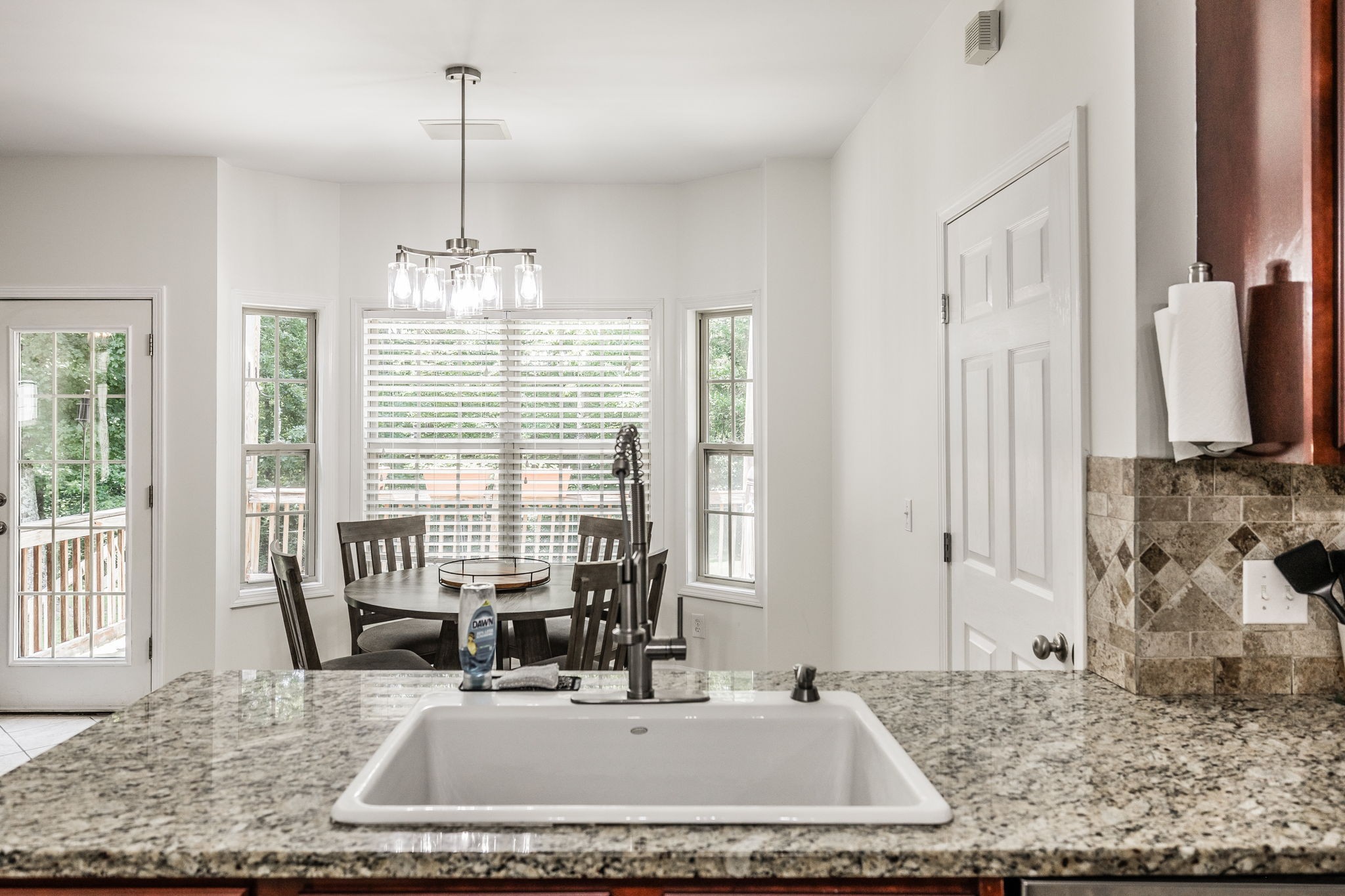2860 Morgan Road Joelton, TN 37080 - Photo 15 of 45 a view of a kitchen with granite countertop a sink and a window