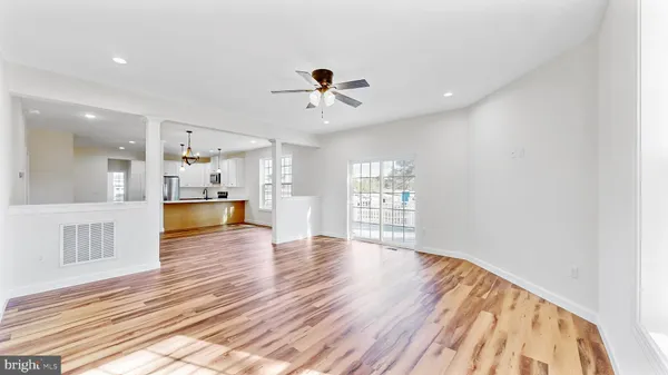 a kitchen with stainless steel appliances a refrigerator stove and microwave