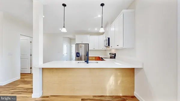 a view of kitchen and utility room