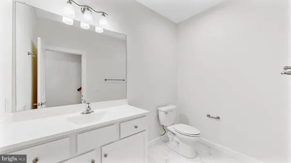 an empty room with a empty space and a window