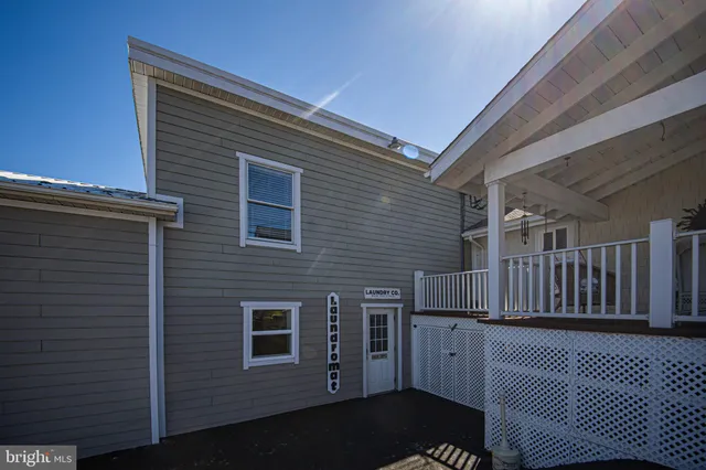 a bedroom with a bed and a table