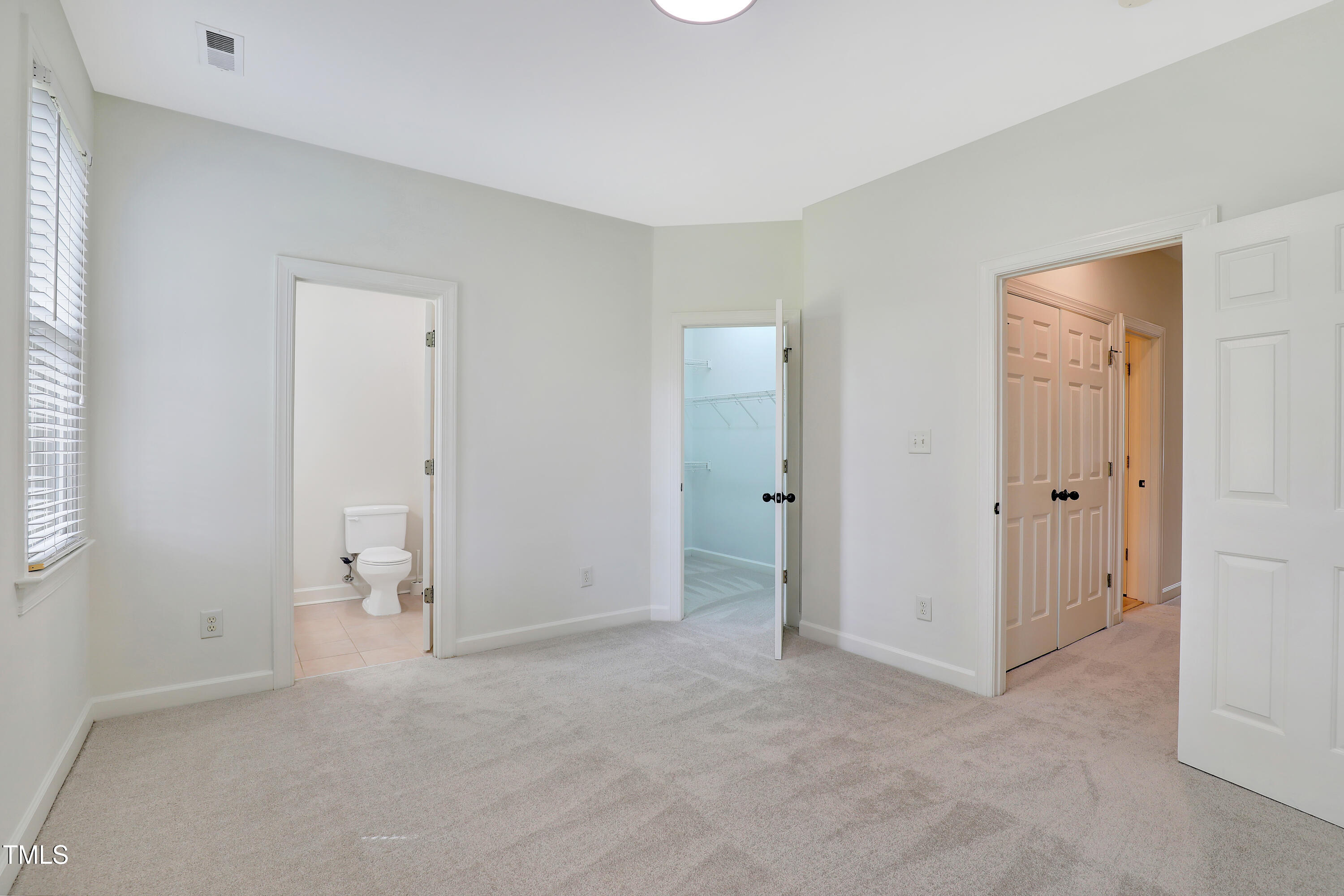 814 Cotton Exchange Court Raleigh, NC 27608 - Photo 21 of 35 wooden floor and closet area in a room