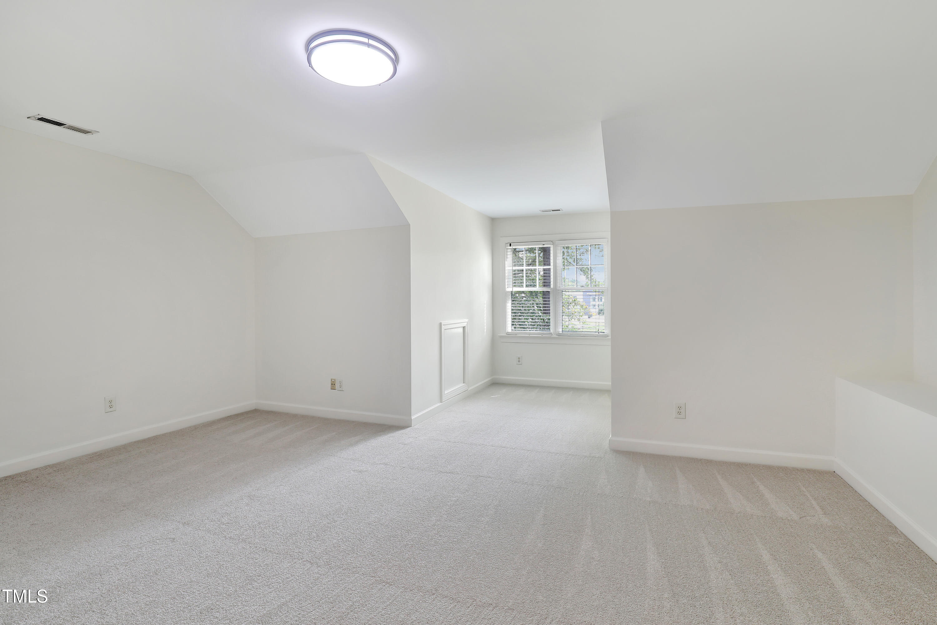 814 Cotton Exchange Court Raleigh, NC 27608 - Photo 29 of 35 an empty room with a empty space and windows