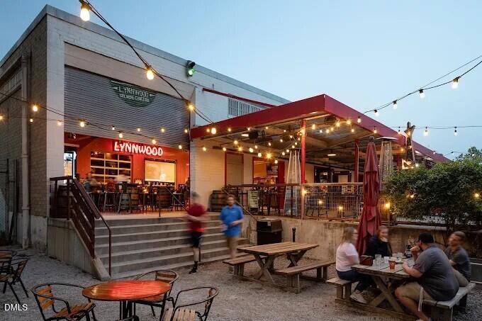 814 Cotton Exchange Court Raleigh, NC 27608 - Photo 33 of 35 a view of a chairs and tables in a patio
