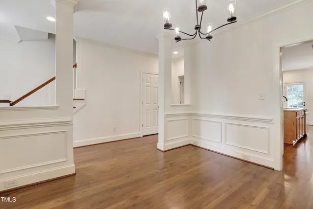 a kitchen with stainless steel appliances a stove top oven a sink and a refrigerator