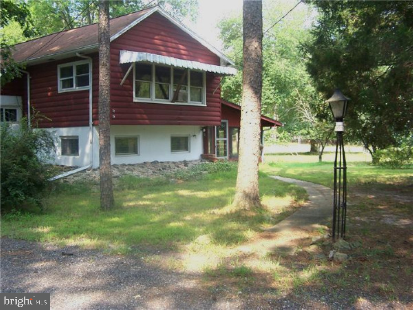 573 Tabernacle Road Medford, NJ 08055 - Photo 18 of 22 a front view of a house with a yard