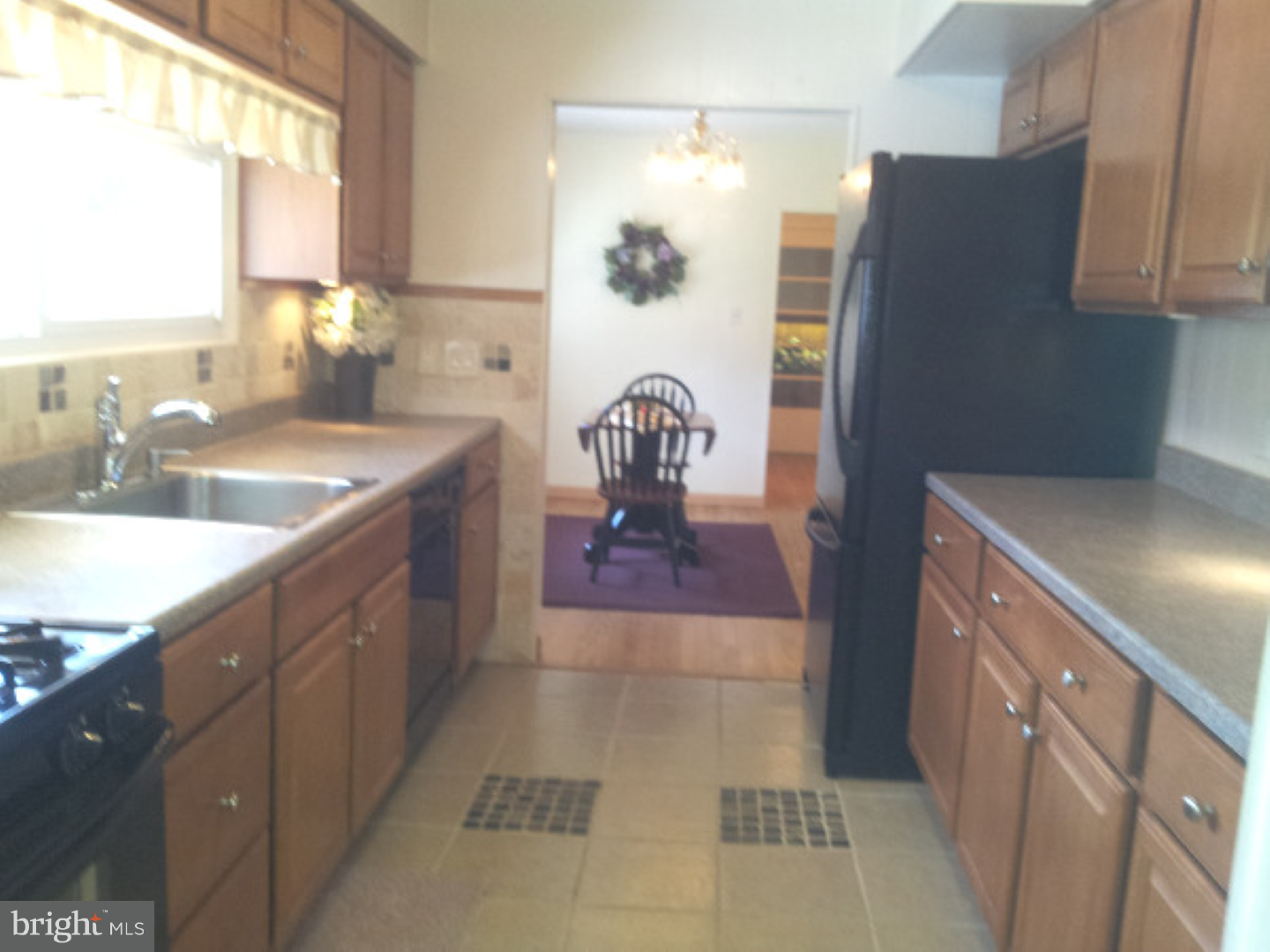 573 Tabernacle Road Medford, NJ 08055 - Photo 6 of 22 a kitchen with a sink a counter top space and cabinets