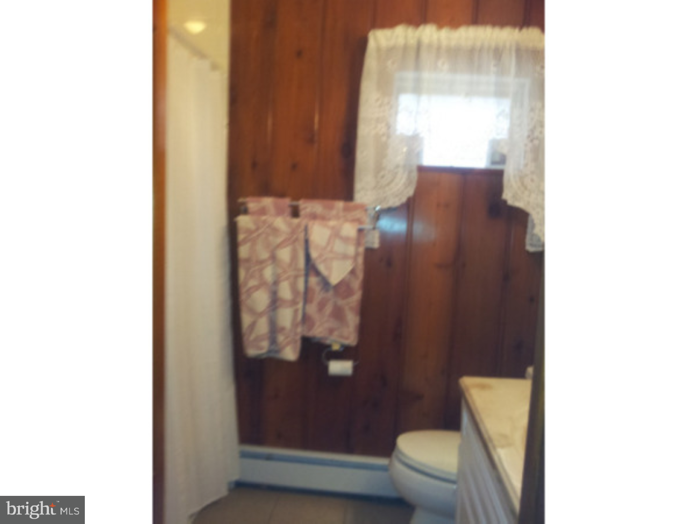 573 Tabernacle Road Medford, NJ 08055 - Photo 8 of 22 a bathroom with a toilet and a mirror