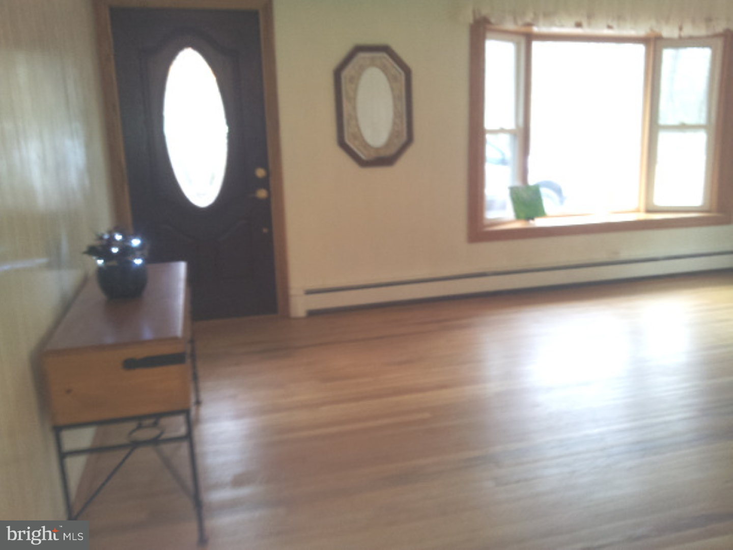 573 Tabernacle Road Medford, NJ 08055 - Photo 10 of 22 a room with wooden floor and windows