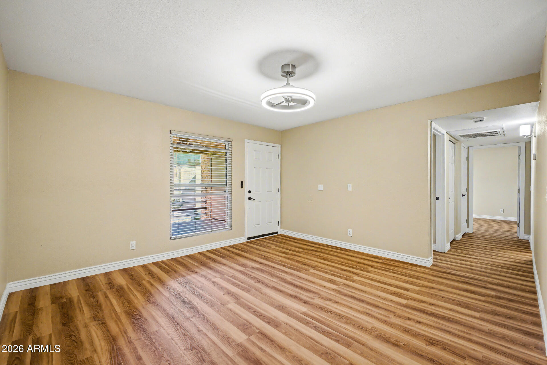 1340 North Recker Road, Unit 210 Mesa, AZ 85205 - Photo 16 of 45 greatroom into hallway