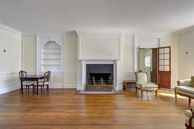 a view of a kitchen with refrigerator and cabinet