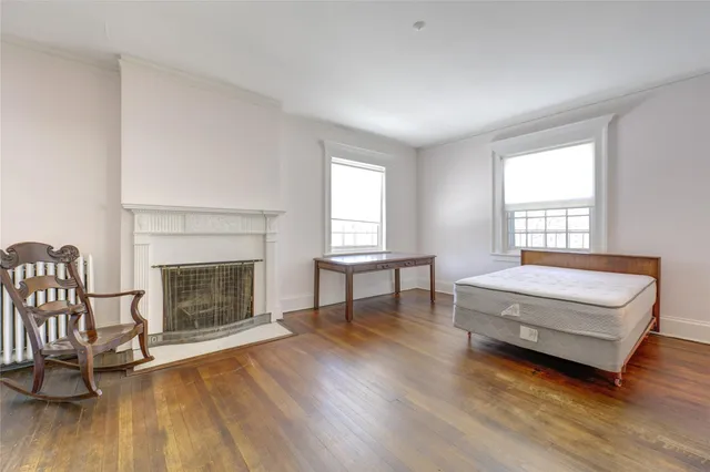 a bathroom with a sink toilet tub and shower