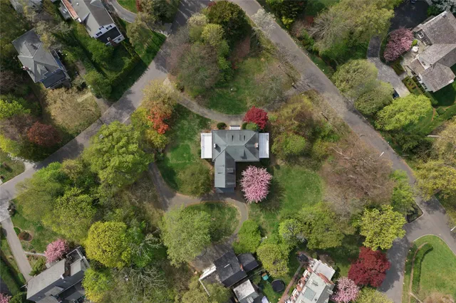 a backyard of a house with lots of green space