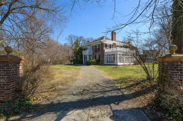 a view of a house with swimming pool