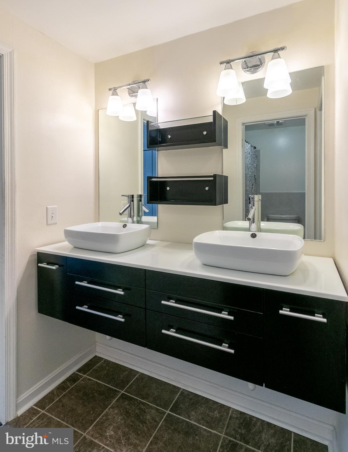 12155 Dove Circle Laurel, MD 20708 - Photo 13 of 18 Upper level full bath w/ gorgeous double sinks