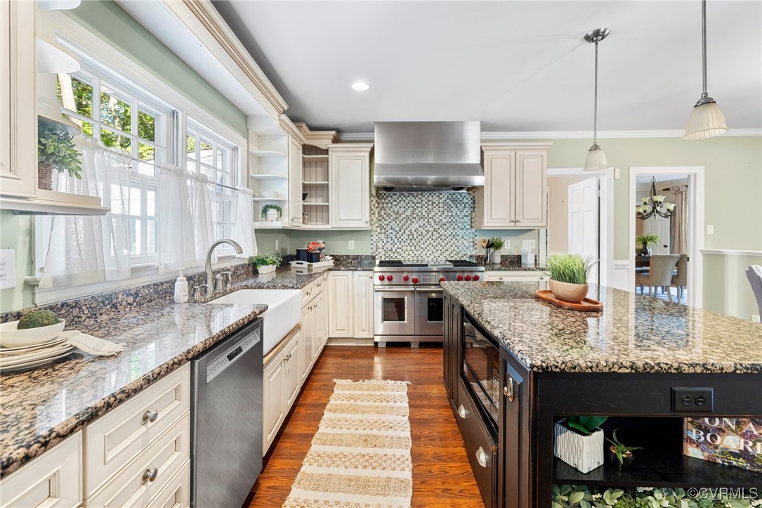 17 Dahlgren Road Richmond, VA 23238 - Photo 17 of 49 a kitchen with stainless steel appliances granite countertop a sink and stove