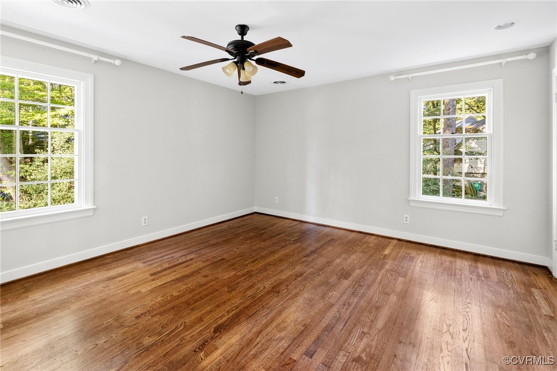 17 Dahlgren Road Richmond, VA 23238 - Photo 26 of 49 a view of a big room with wooden floor and windows