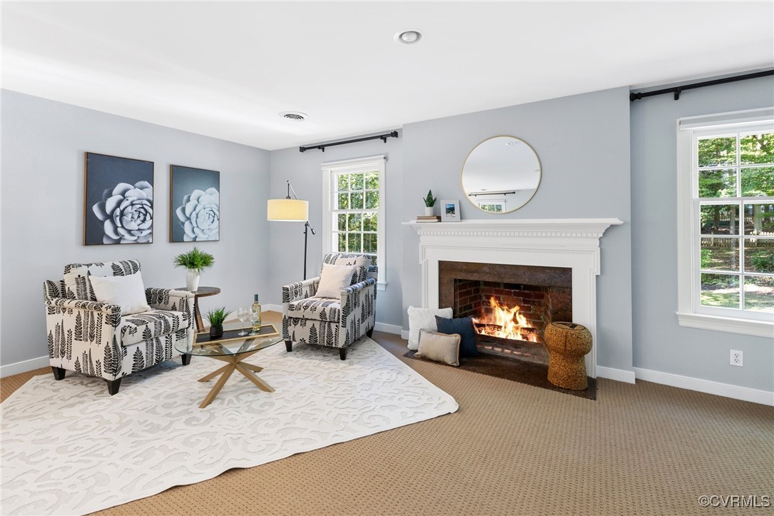 17 Dahlgren Road Richmond, VA 23238 - Photo 30 of 49 a living room with furniture and a fireplace
