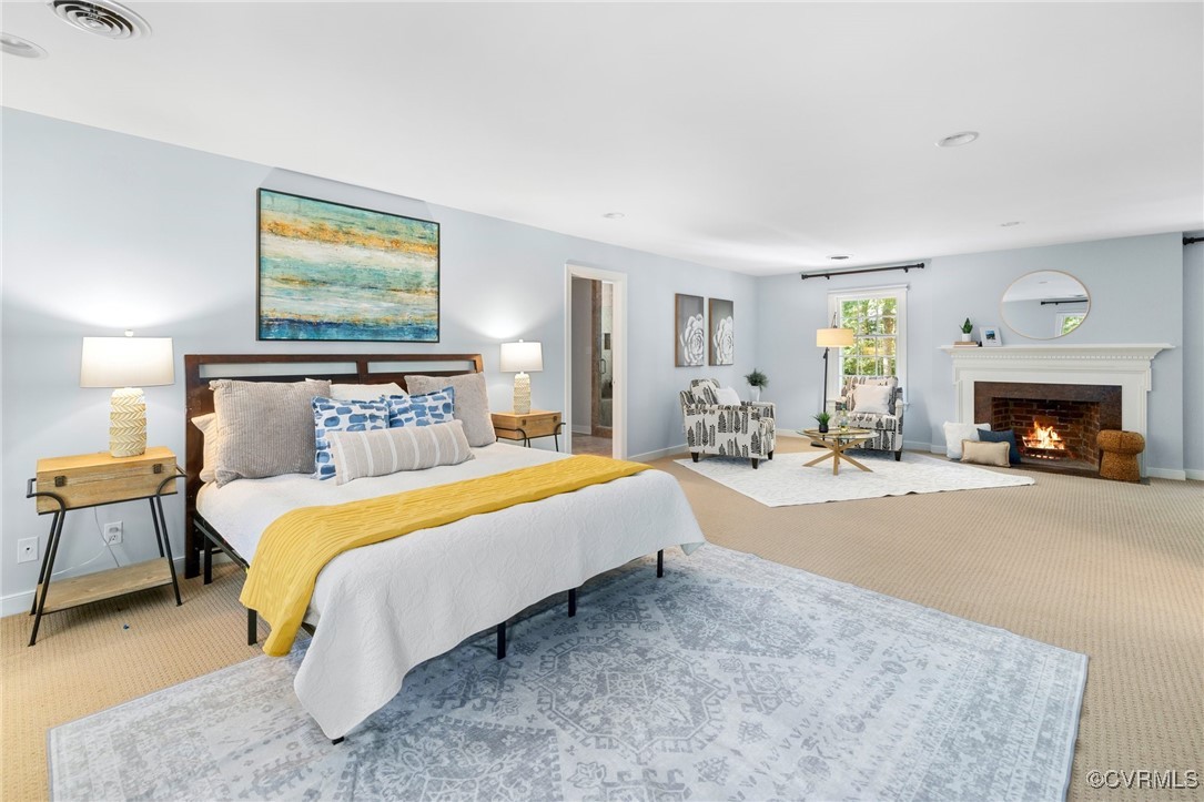 17 Dahlgren Road Richmond, VA 23238 - Photo 31 of 49 a bed room with a bed and a fireplace