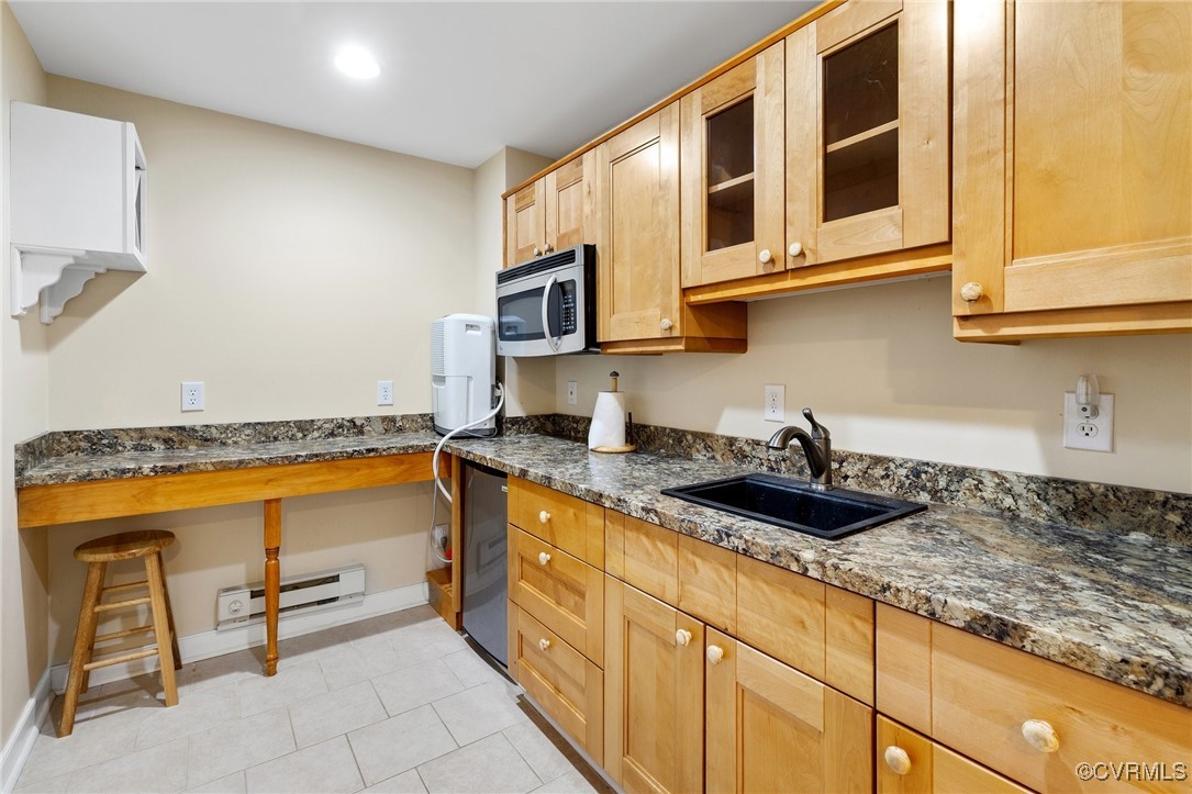 17 Dahlgren Road Richmond, VA 23238 - Photo 38 of 49 a kitchen with stainless steel appliances granite countertop a sink and cabinets