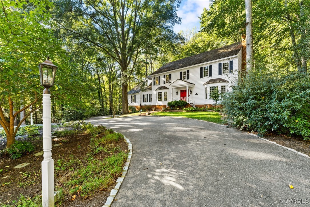 17 Dahlgren Road Richmond, VA 23238 - Photo 49 of 49 a front view of a house with a yard and trees