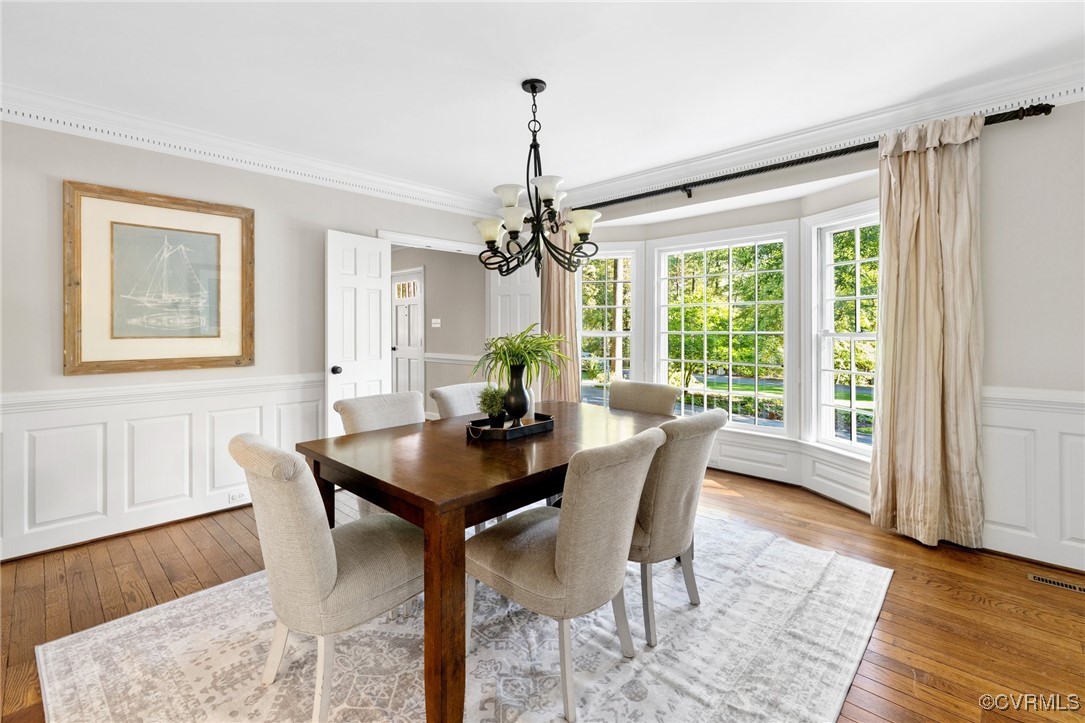 17 Dahlgren Road Richmond, VA 23238 - Photo 9 of 49 a view of a dining room with furniture window and wooden floor