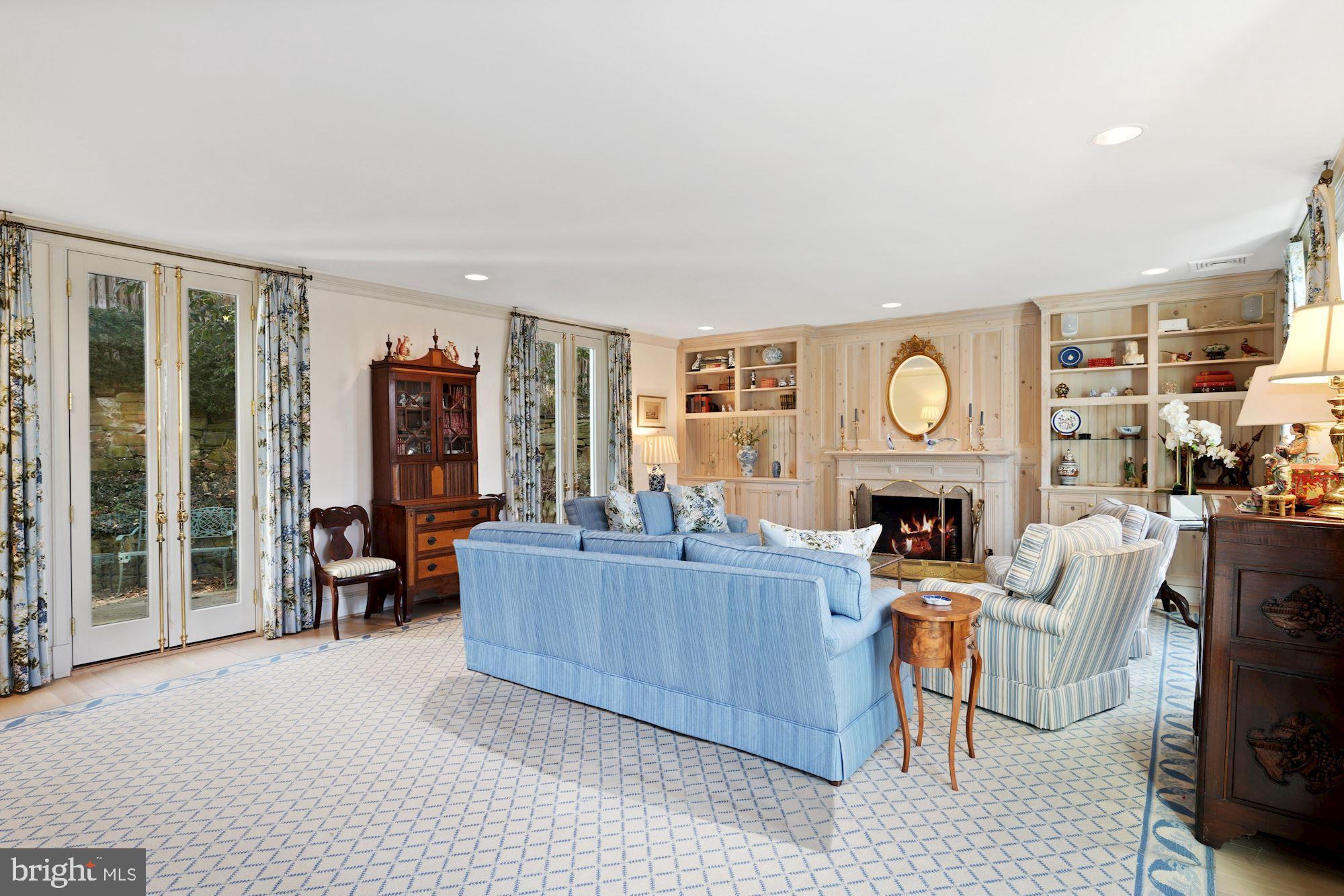 4777 Dexter Street Northwest Washington, DC 20007 - Photo 4 of 30 Living Room with Four Sets of French Doors