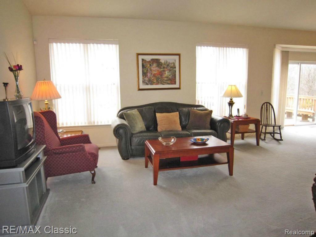 5297 Simpson Lake Road, Unit 80 West Bloomfield, MI 48323 - Photo 3 of 18 simpson living room1.jpg