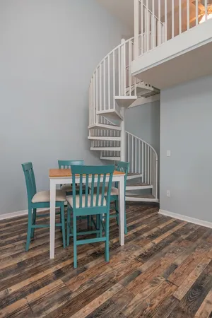 a view of entryway with wooden floor