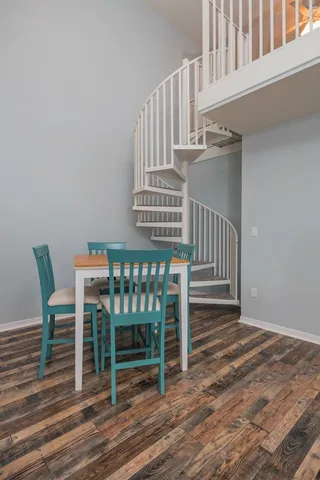 a view of entryway with wooden floor