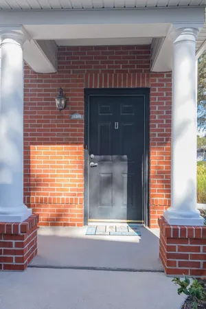 a living room with a couch and a window