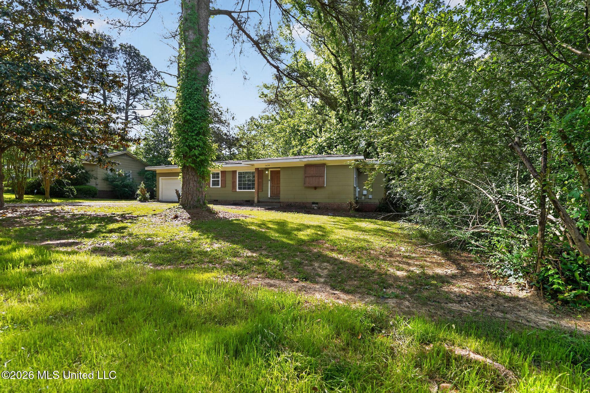 1639 Lockwood Avenue Jackson, MS 39211 - Photo 3 of 30 05_1639_Lockwood_Ave_Jackson_MS_39211-Ex