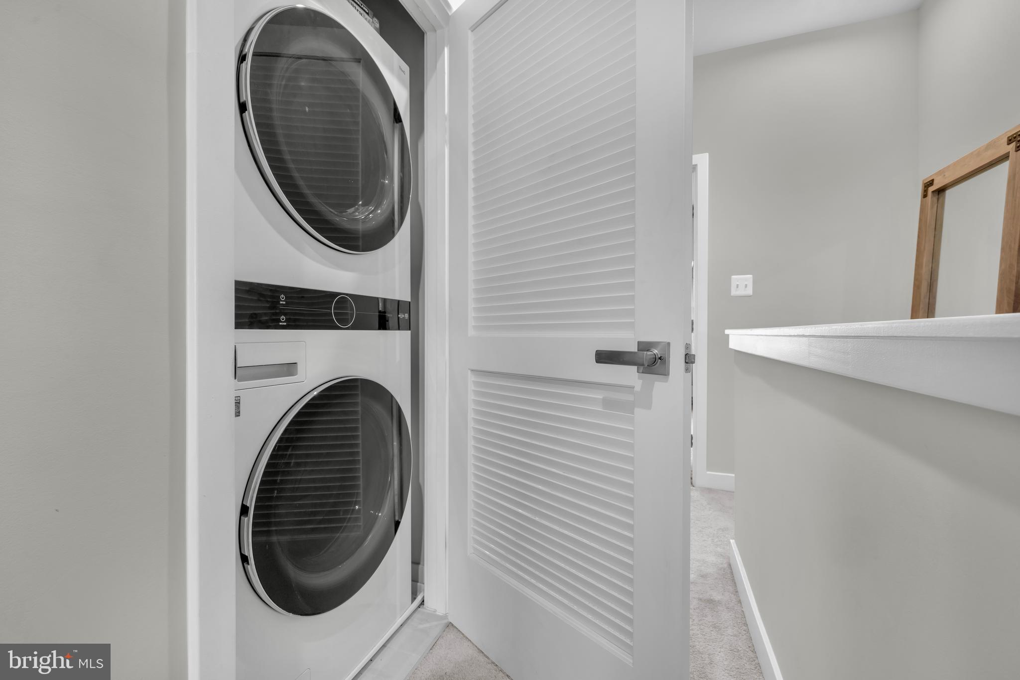 7111 Sollers Point Road Baltimore, MD 21222 - Photo 25 of 61 a utility room with dryer and washer