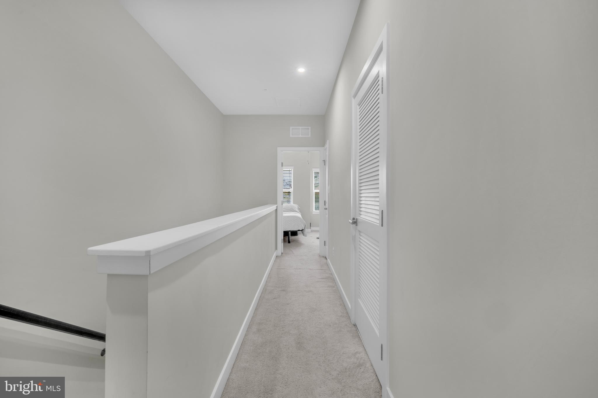 7111 Sollers Point Road Baltimore, MD 21222 - Photo 26 of 61 a view of a hallway with wooden floor