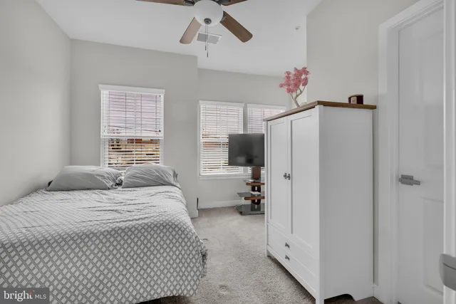a view of a living room and entry way