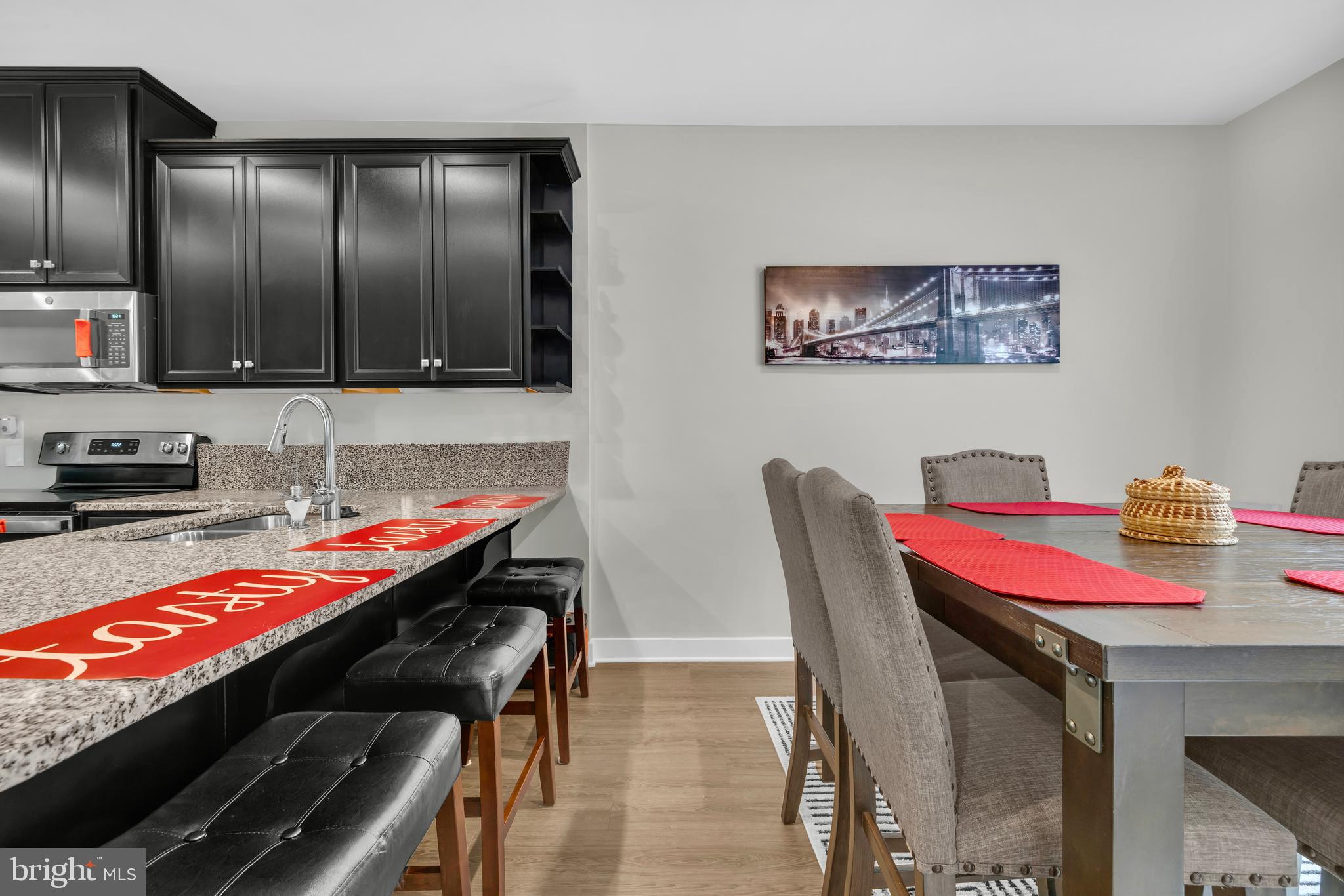 7111 Sollers Point Road Baltimore, MD 21222 - Photo 3 of 61 a kitchen with a table and chairs