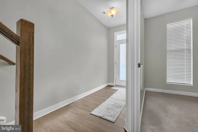 a view of a livingroom with white walls